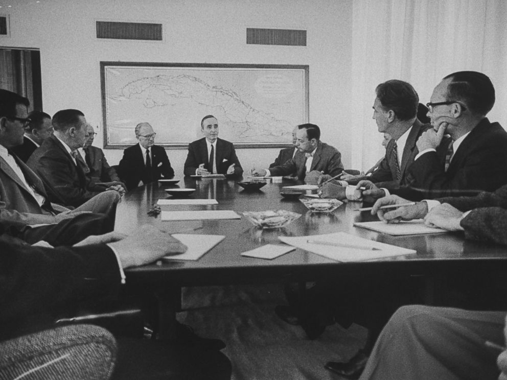PHOTO: Ambassador Philip W. Bonsal meets with his staff at the U.S. Embassy in Havana, Cuba in 1960.