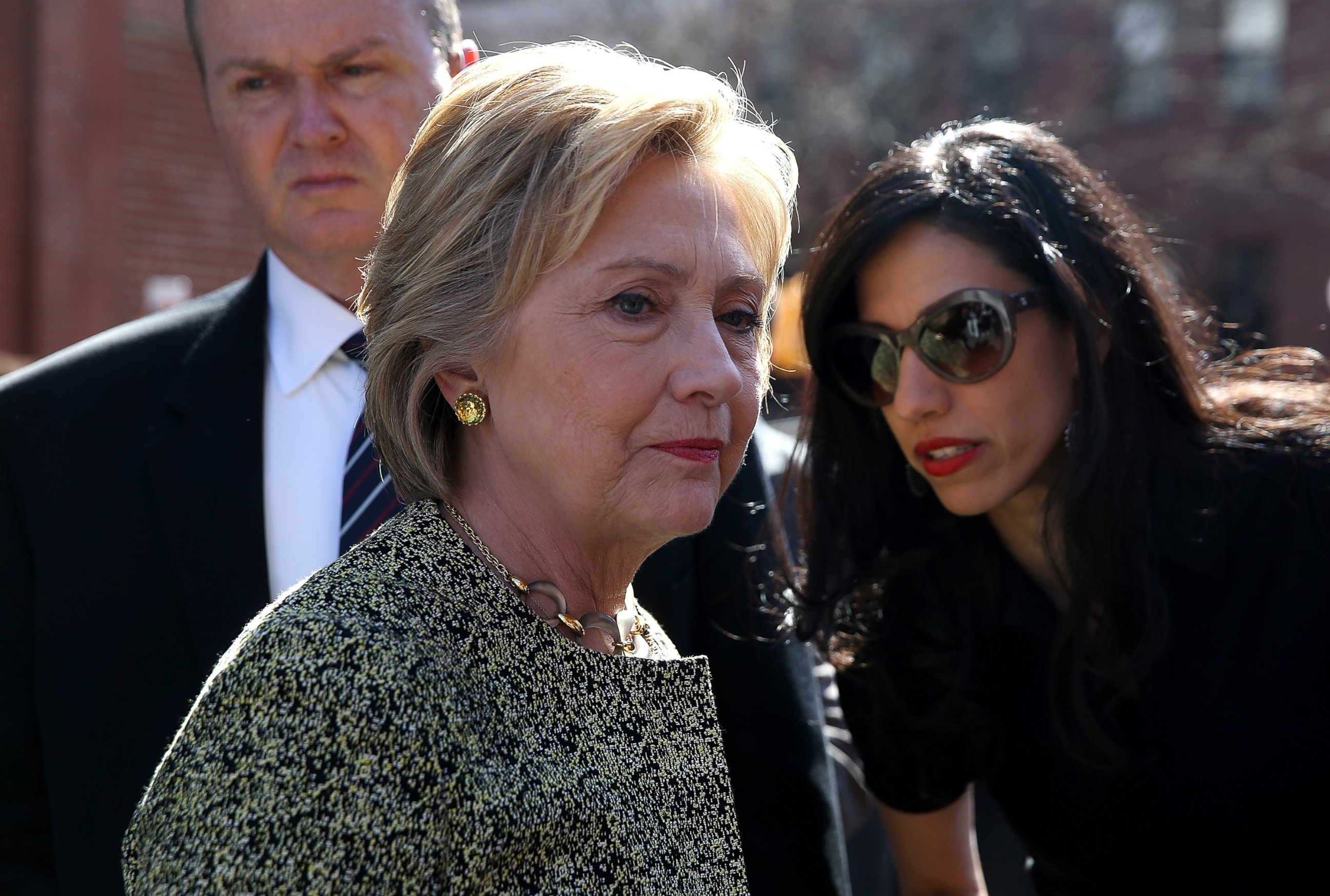 PHOTO: Democratic presidential candidate Hillary Clinton talks with aide Huma Abedin before speaking at a neighborhood block party in the Brooklyn borough of New York City, April 17, 2016.