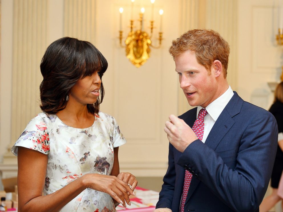 PHOTO: Prince Harry speaks with First Lady Michelle Obama during the first day of his visit to the United States on May 9, 2013 in Washington, DC.