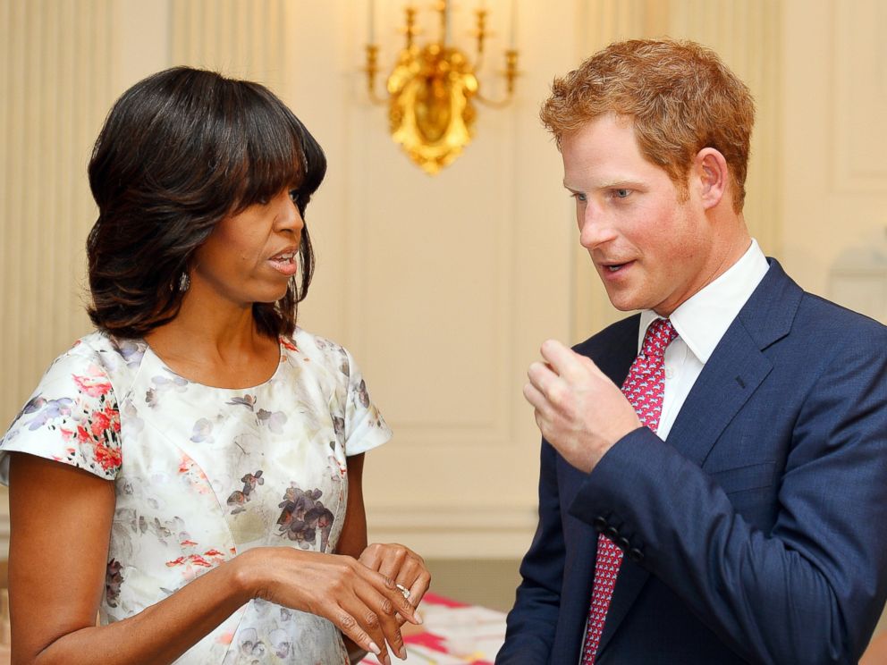 PHOTO: Prince Harry speaks with First Lady Michelle Obama during the first day of his visit to the United States on May 9, 2013 in Washington, DC.