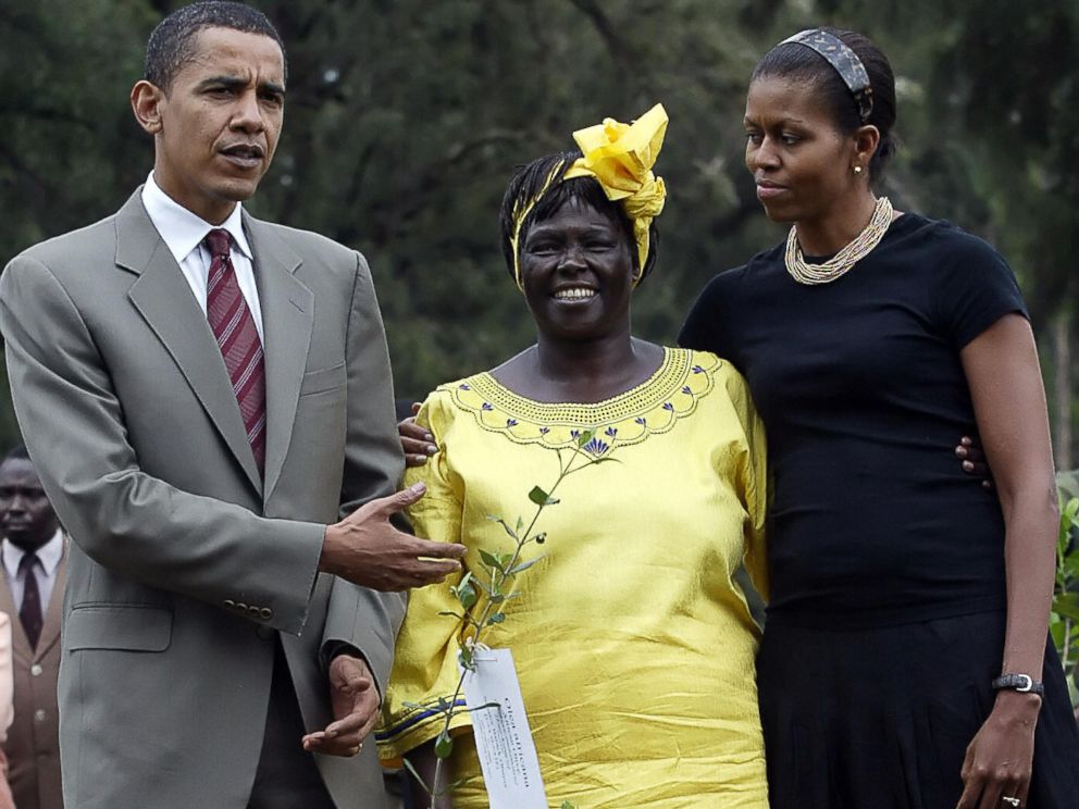 PHOTO: Barack Obama gestures while posing with his wife Michelle and Wangari Mathai at a tree planting ceremony in Nairobi, Kenya, 28 Aug. 2006.