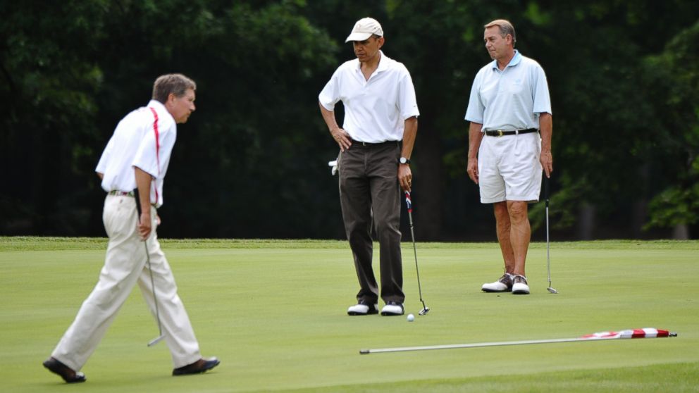 President Barack Obama and John Boehner, right, play on the first hole with Ohio Governor John Kasich during a game of golf on June 18, 2011 at Andrews Air Force Base.