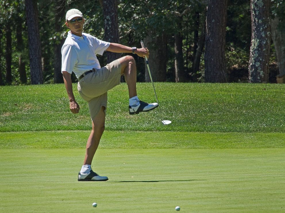 PHOTO: President Barack Obama reacts to a missed putt on the first green at Farm Neck Golf Club in Oak Bluffs, Mass. on August 11, 2013 during the Obama family vacation to Marthas Vineyard.