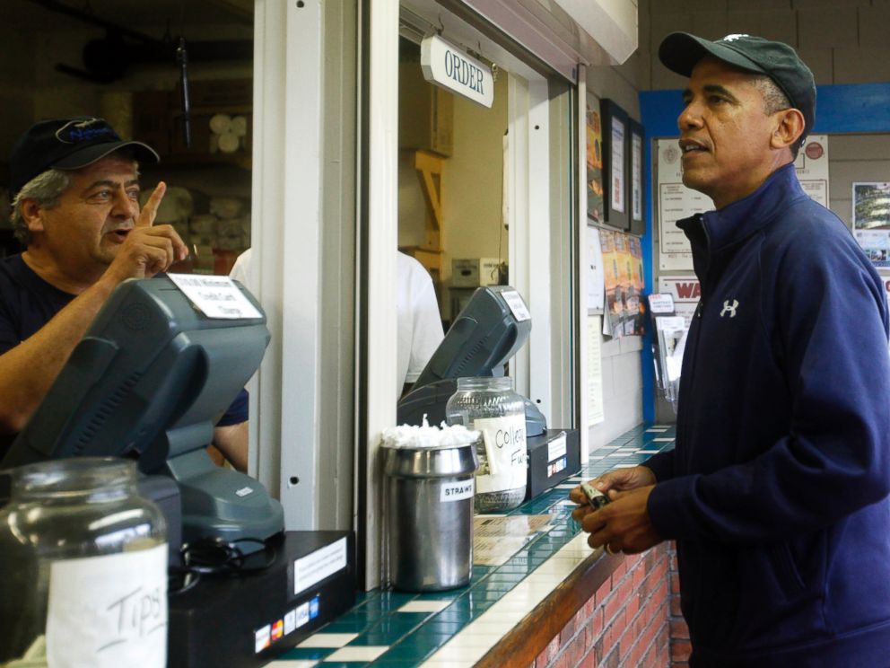 PHOTO: President Barack Obama places an order at Nancys Restaurant on August 13, 2013 in Oak Bluffs, Mass.