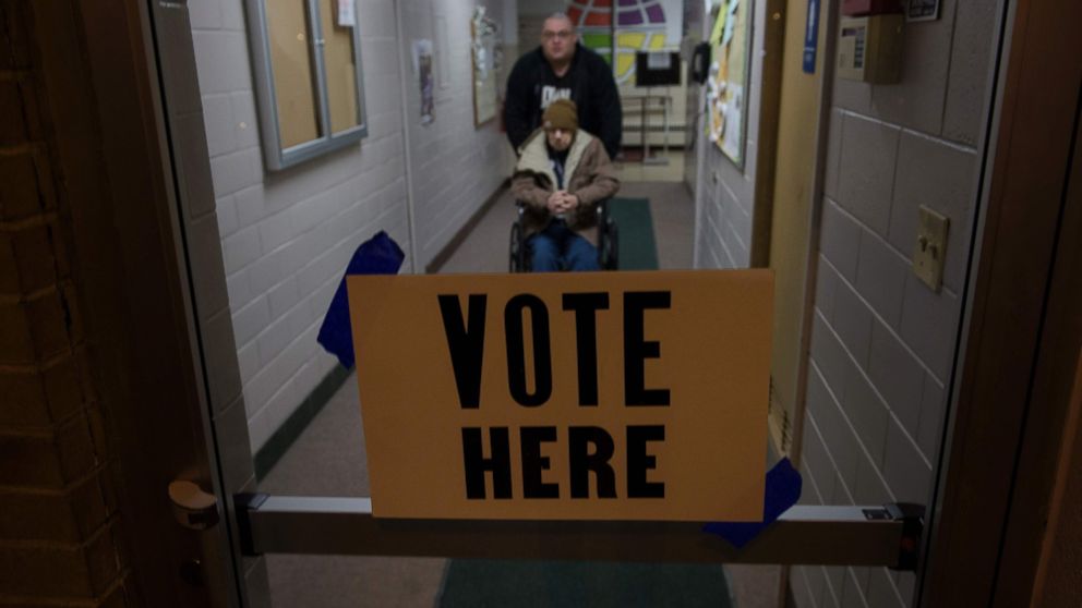 PHOTO: Voters leave a polling station during primary voting, March 15, 2016, in Canton, Ohio. 
