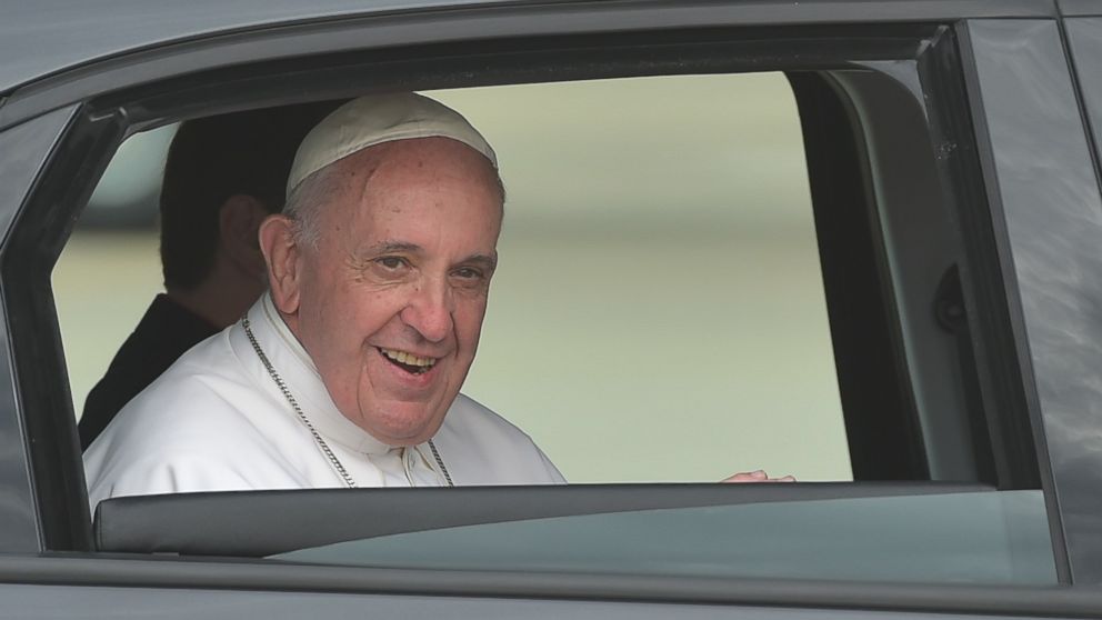 PHOTO: Pope Francis looks out of the window of his automobile after after his arrival at Andrews Air Force Base in Maryland on Sept. 22, 2015.