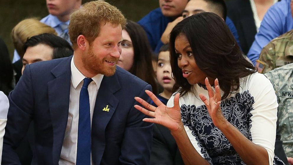 Prince Harry and First Lady Michelle Obama attend a Wounded Warriors basketball game to highlight Joining Forces Initiative and the upcoming 2016 Invictus Games at Wells Field House on October 28, 2015 in Fort Belvoir, Virginia.