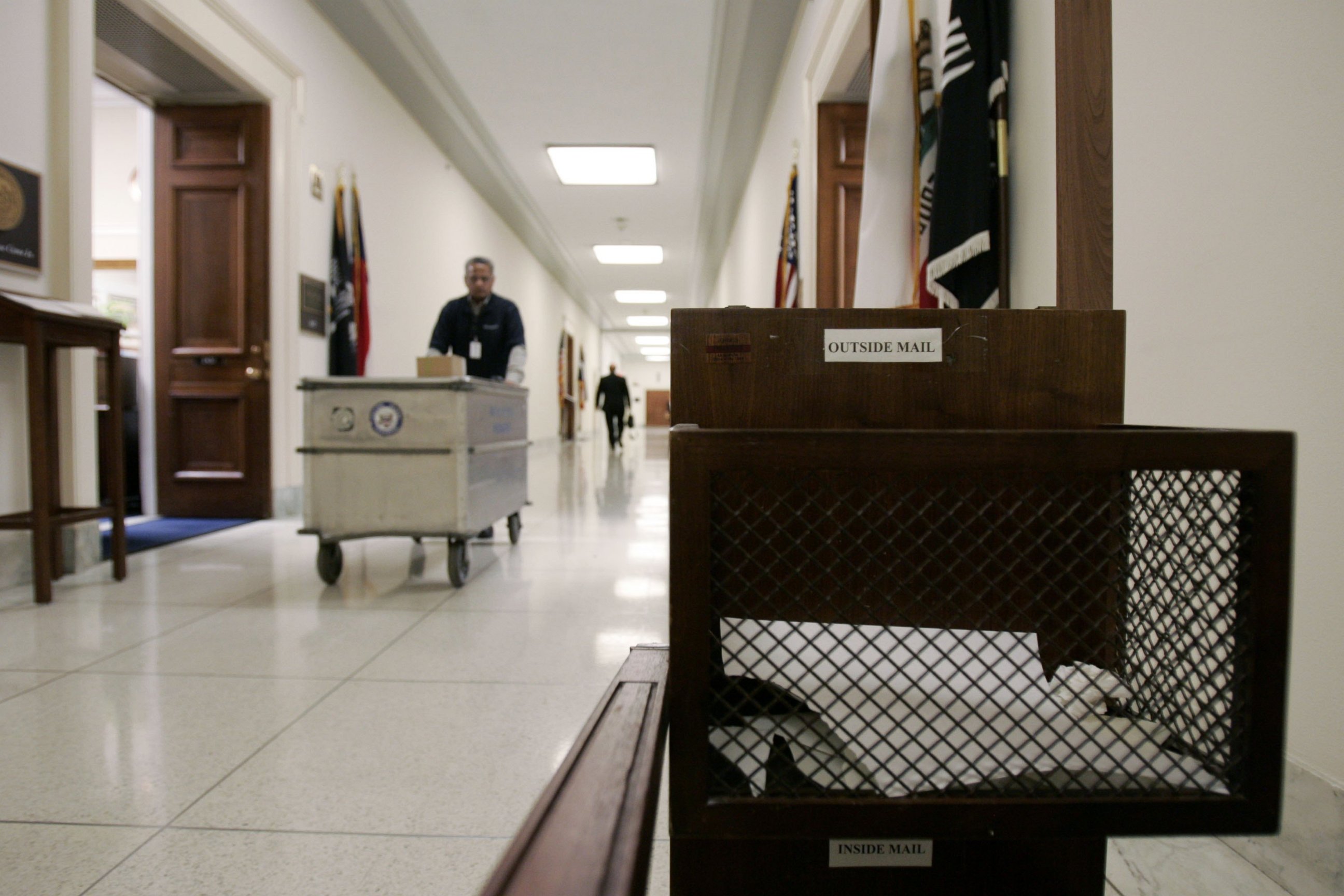 PHOTO: A mail bin fills up in the hallways of the Rayburn Building along with furniture, lamps and boxes from offices being moved and cleaned out on Dec. 13, 2006 on Capitol Hill in Washington, D.C.