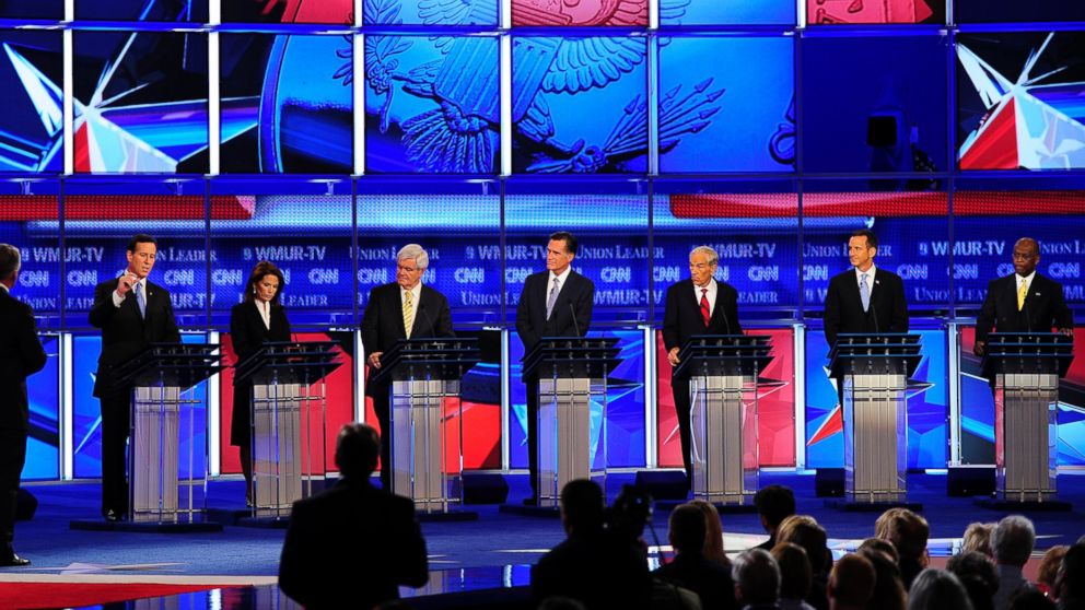 PHOTO: (L-R) Rick Santorum, Michele Bachmann, Newt Gingrich, Mitt Romney, Ron Paul, Tim Pawlenty, Herman Cain address the first 2012 Republican presidential candidates' debate in Manchester, New Hampshire, June 13, 2011. 