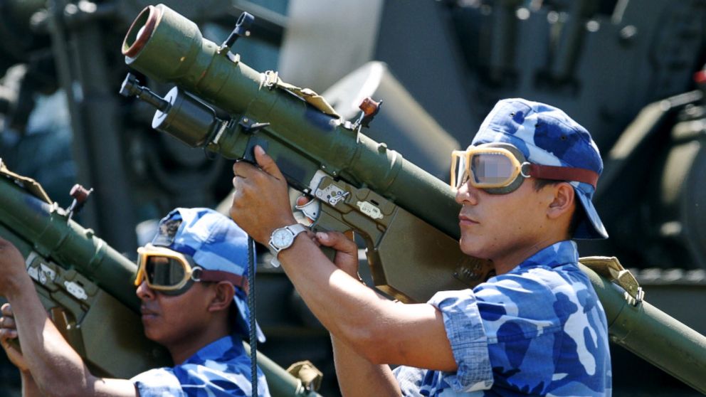 PHOTO: Nicaraguan soldiers carry SA-7 anti-aircraft missiles during a parade in Managua in 2003.