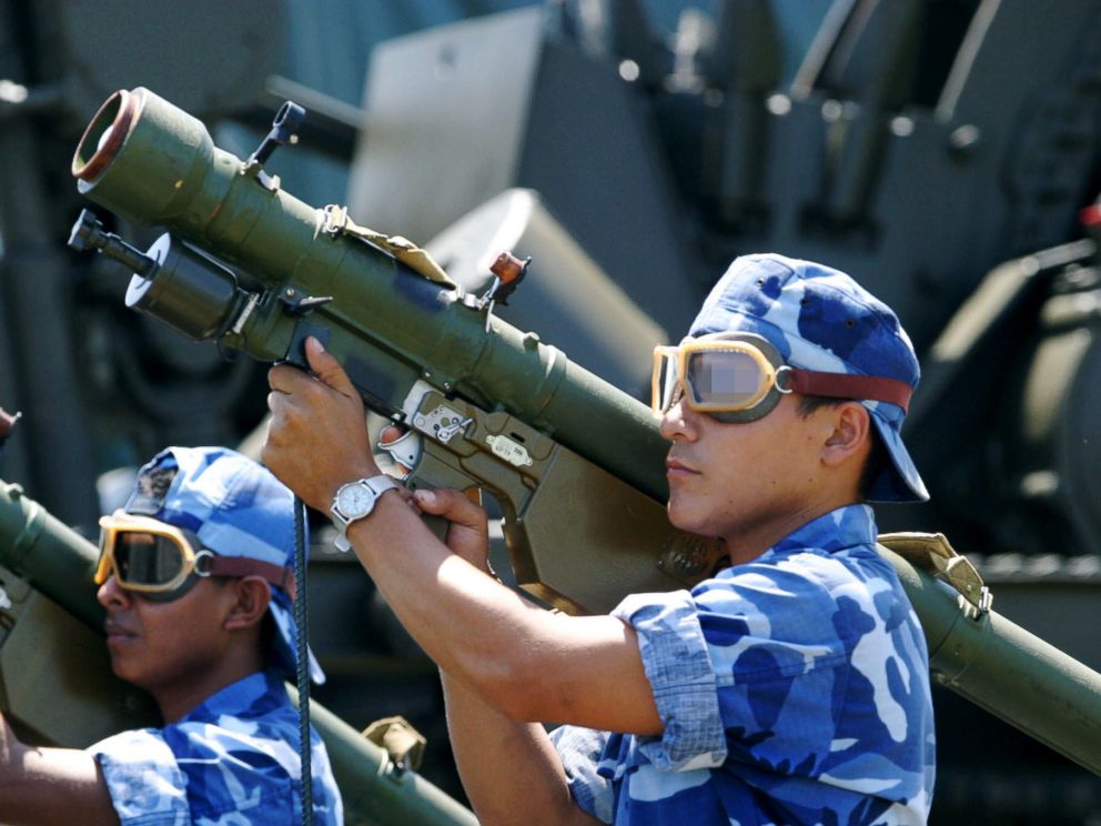 PHOTO: Nicaraguan soldiers carry SA-7 anti-aircraft missiles during a parade in Managua in 2003.