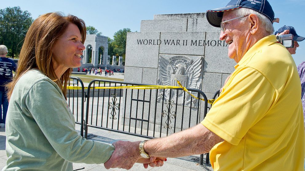 PHOTO: US Rep. Michelle Bachmann, R-MN, greets a US military war veteran 