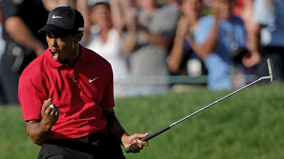 Tiger Woods reacts to his birdie putt on the 18th green to force a playoff with Rocco Mediate during the final round of the 108th U.S. Open in San Diego, in this June 15, 2008 photo.