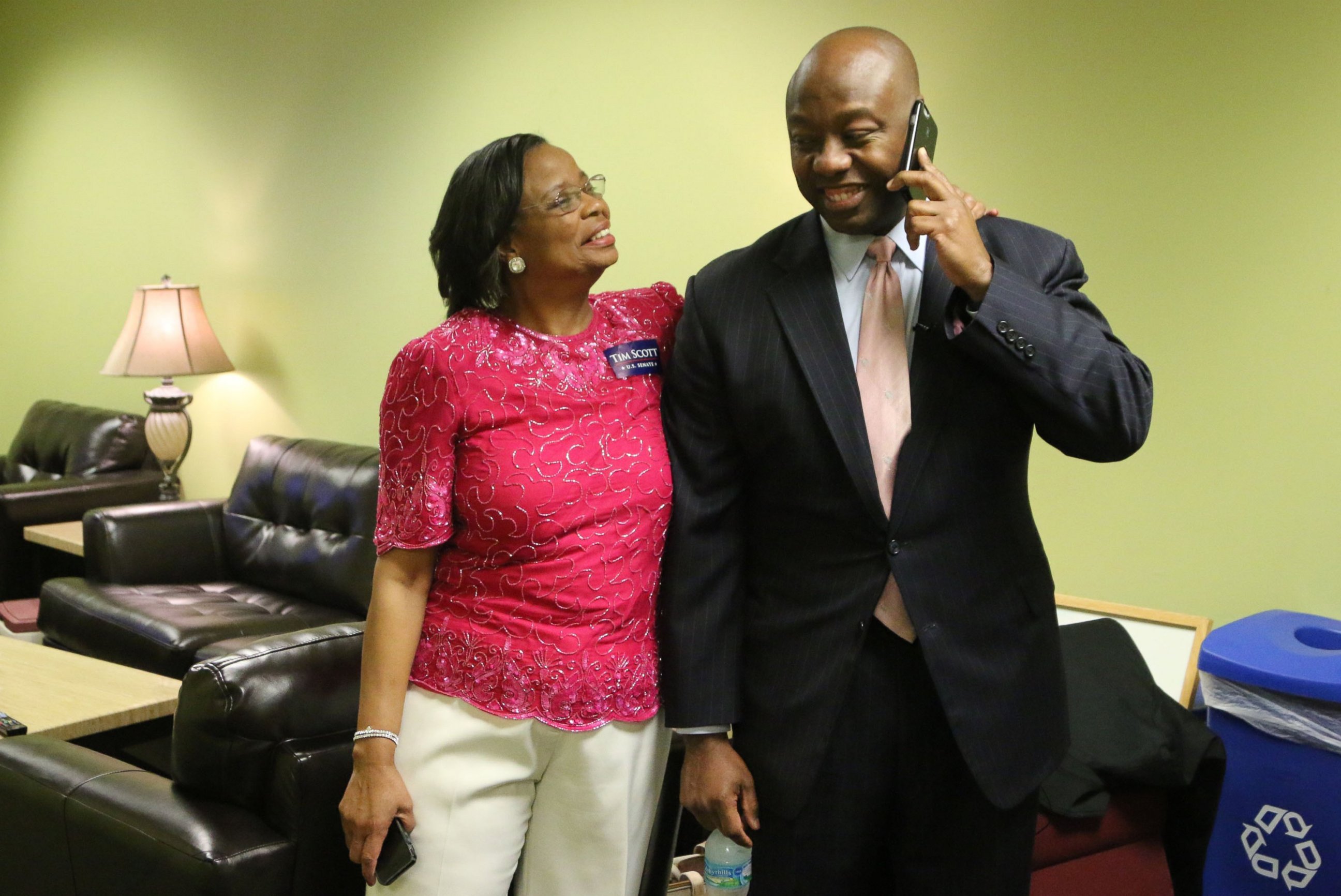 PHOTO: Joined by his mother Frances Scott, newly-elected U.S. Sen. Tim Scott receives a congratulatory call from President Obama at the North Charleston Performing Arts Center, Nov. 4, 2014.