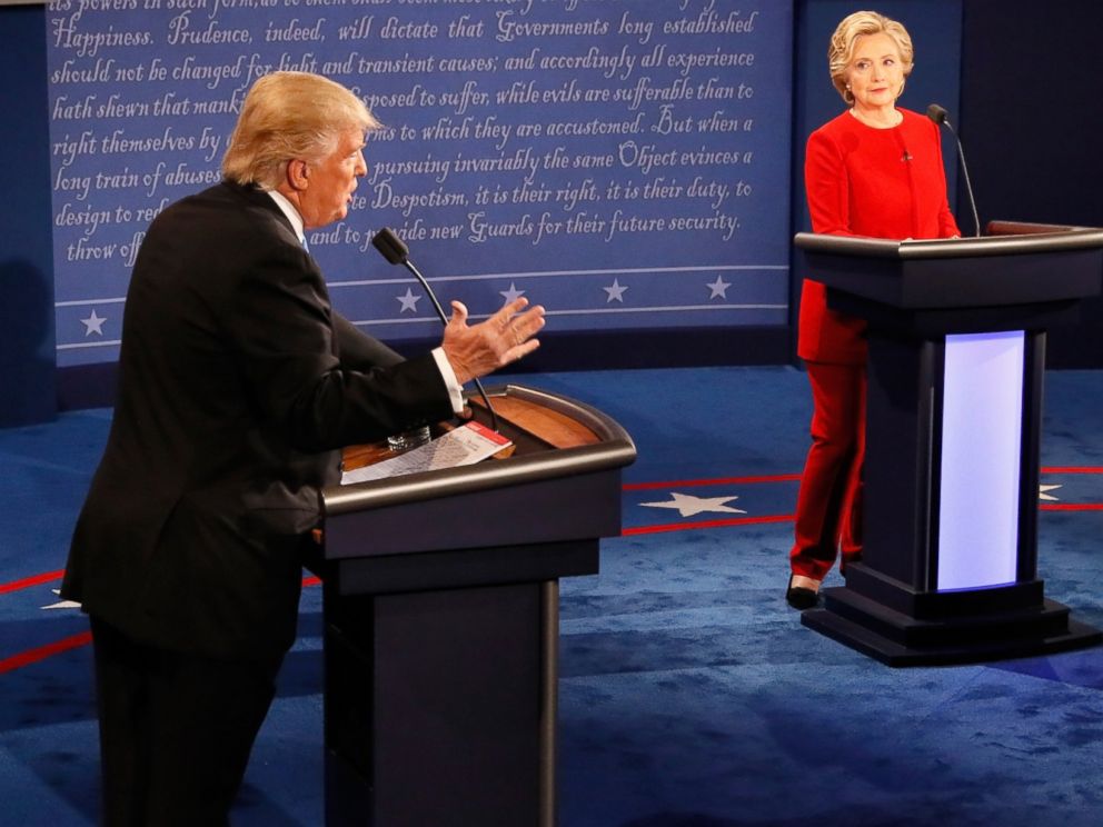 PHOTO: Republican presidential nominee Donald Trump speaks as Democratic presidential nominee Hillary Clinton listens during the Presidential Debate at Hofstra University on Sept. 26, 2016 in Hempstead, New York.