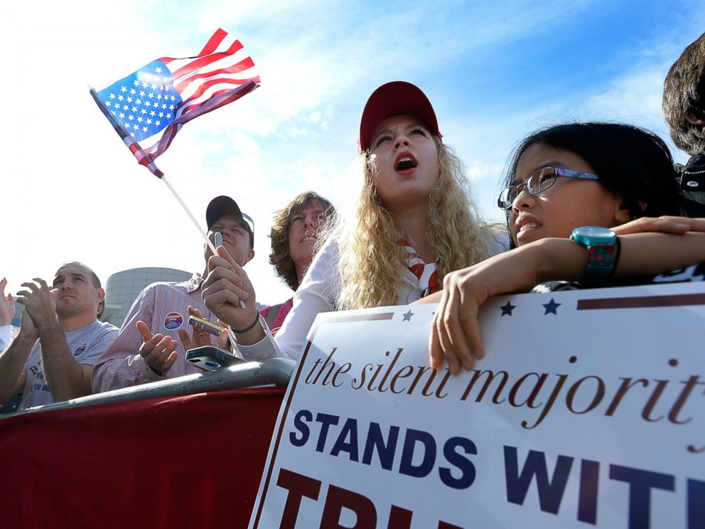 PHOTO: Donald Trump supporters cheer for the Republican presidential while he speaks at a rally in front of the USS Wisconsin on Oct. 31, 2015 in Norfolk, Va.