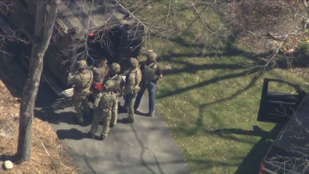 PHOTO: Armed FBI agents swarmed a Massachusetts home Thursday afternoon, hours after sources and multiple reports said the agency was seeking to question a member of the Massachusetts Air National Guard, April 13, 2023.