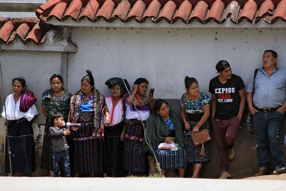 PHOTO: Guatemalan migrants deported from the United States remain outside the Air Force Base after their arrival in Guatemala City, July 31, 2019.