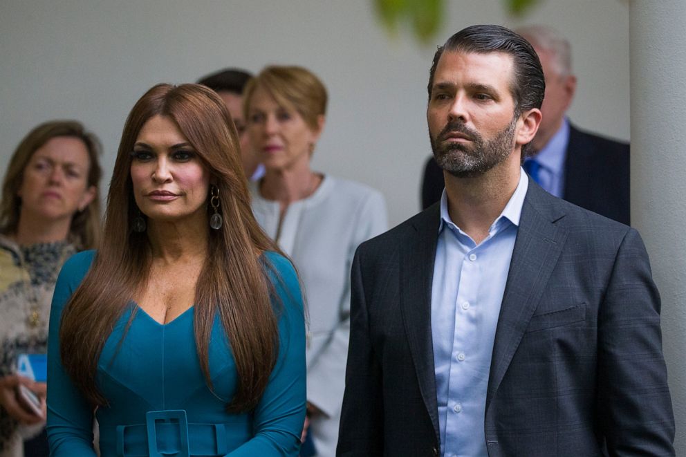 PHOTO: In this July 11, 2019, file photo, Donald Trump Jr., the son of President Donald Trump, right, and his girlfriend Kimberly Guilfoyle, listen as President Donald Trump speaks about the 2020 census in the Rose Garden of the White House in Washington.
