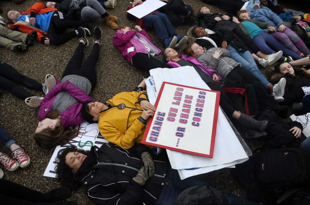 PHOTO: Students take part in a "lie-in" on the road outside of the White House, Feb. 19, 2018 in Washington, D.C.