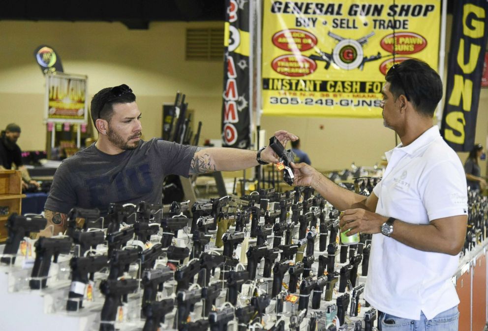 PHOTO: Preparations are underway on Feb. 16, 2018, for the South Florida Gun Show at Dade County Youth Fairgrounds in Miami. Florida.  
