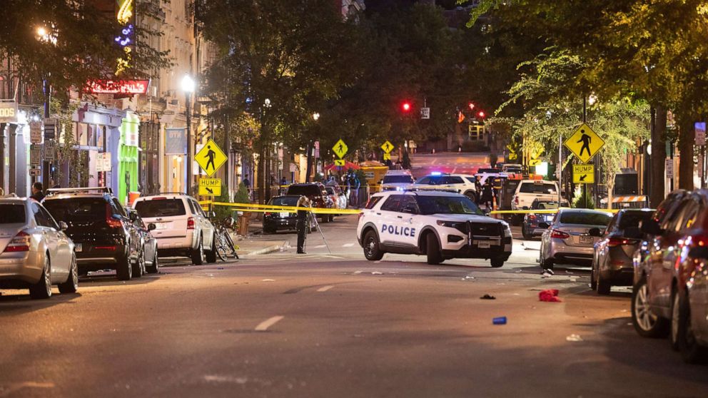 PHOTO: The scene of a mass shooting is cordoned off by law enforcement in Over-the-Rhine, Cincinnati, Aug. 7, 2022.