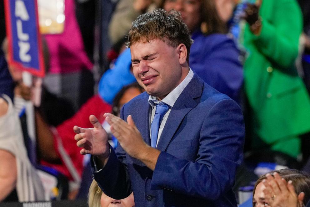 PHOTO: Gus Walz cries as Democratic vice presidential nominee Minnesota Gov. Tim Walz speaks during the Democratic National Convention, Aug. 21, 2024, in Chicago.