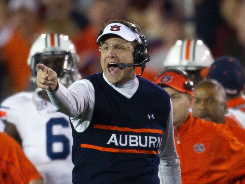 PHOTO: Auburn coach Gus Malzahn yells instructions to his offense in the first half against Florida State in the BCS Championship game at the Rose Bowl on Jan. 6, 2014 in Pasadena, Calif.