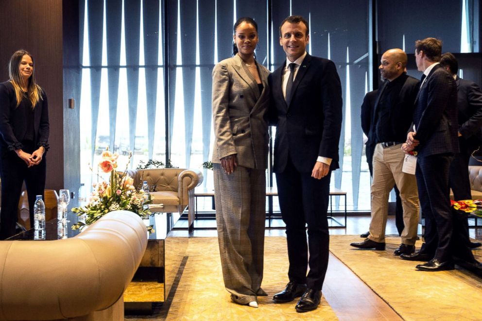 PHOTO: Barbadian singer Rihanna (L) and French President Emmanuel Macron pose a they attend the conference "GPE Financing Conference, an Investment in the Future" organised by the Global Partnership for Education  in Dakar on February 2, 2018.