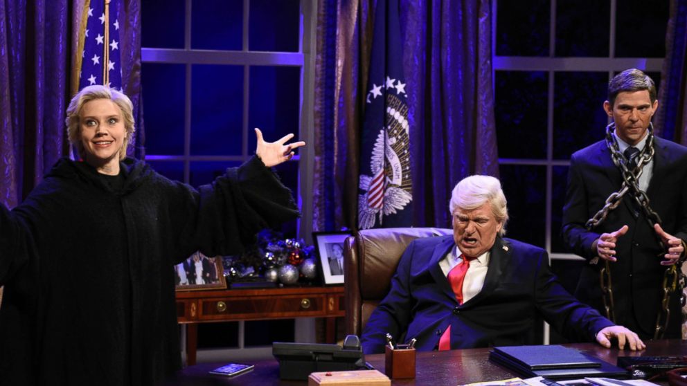 Pictured: (l-r) Kate McKinnon as Hillary Rodham Clinton, Alec Baldwin as President Donald J. Trump, Mikey Day as Michael Flynn during "White House Cold Open" in Studio 8H on Saturday, December 2, 2017.