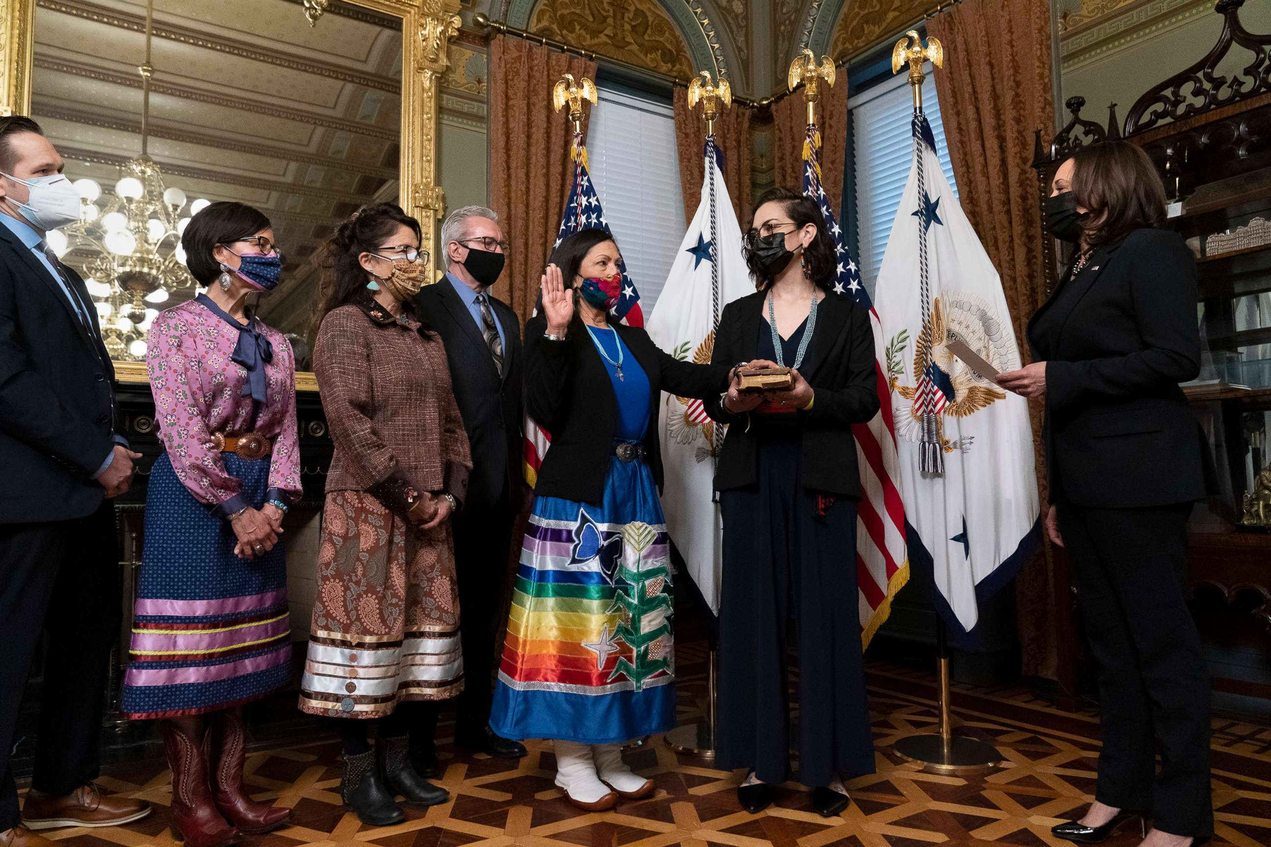 PHOTO: Vice President Kamala Harris, right, speaks during a ceremonial swearing in for Interior Secretary Deb Haaland, third from right, in the Eisenhower Executive Office Building, March 18, 2021, in Washington, D.C.