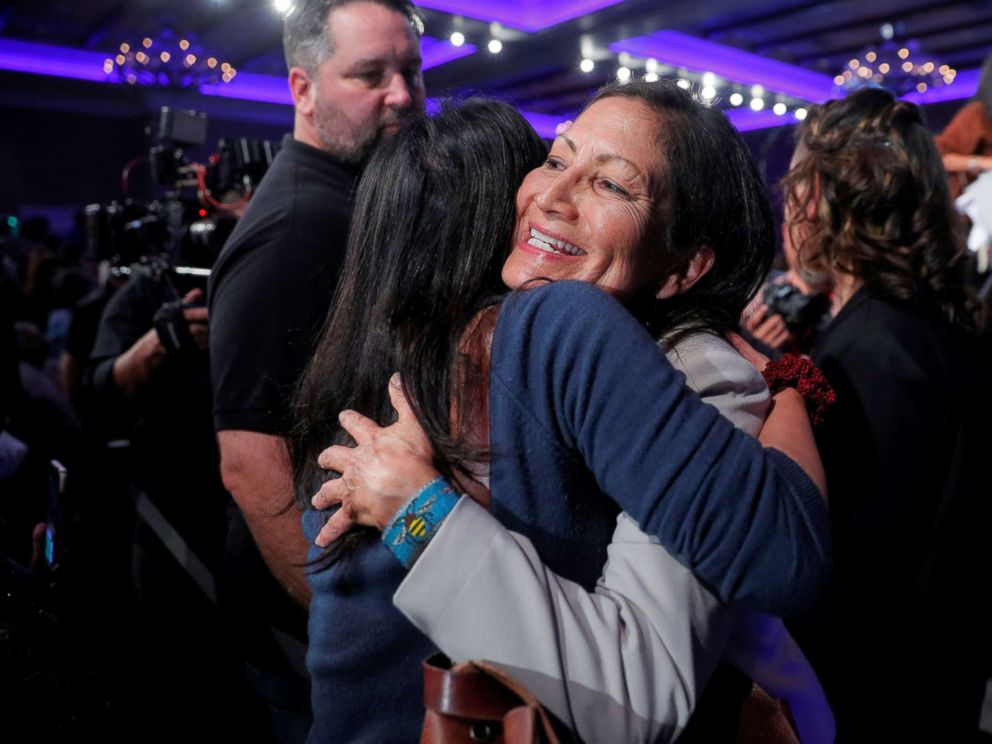 PHOTO: Democratic Congressional candidate Deb Haaland hugs a supporter after winning her midterm election in Albuquerque, New Mexico, Nov. 6, 2018.
