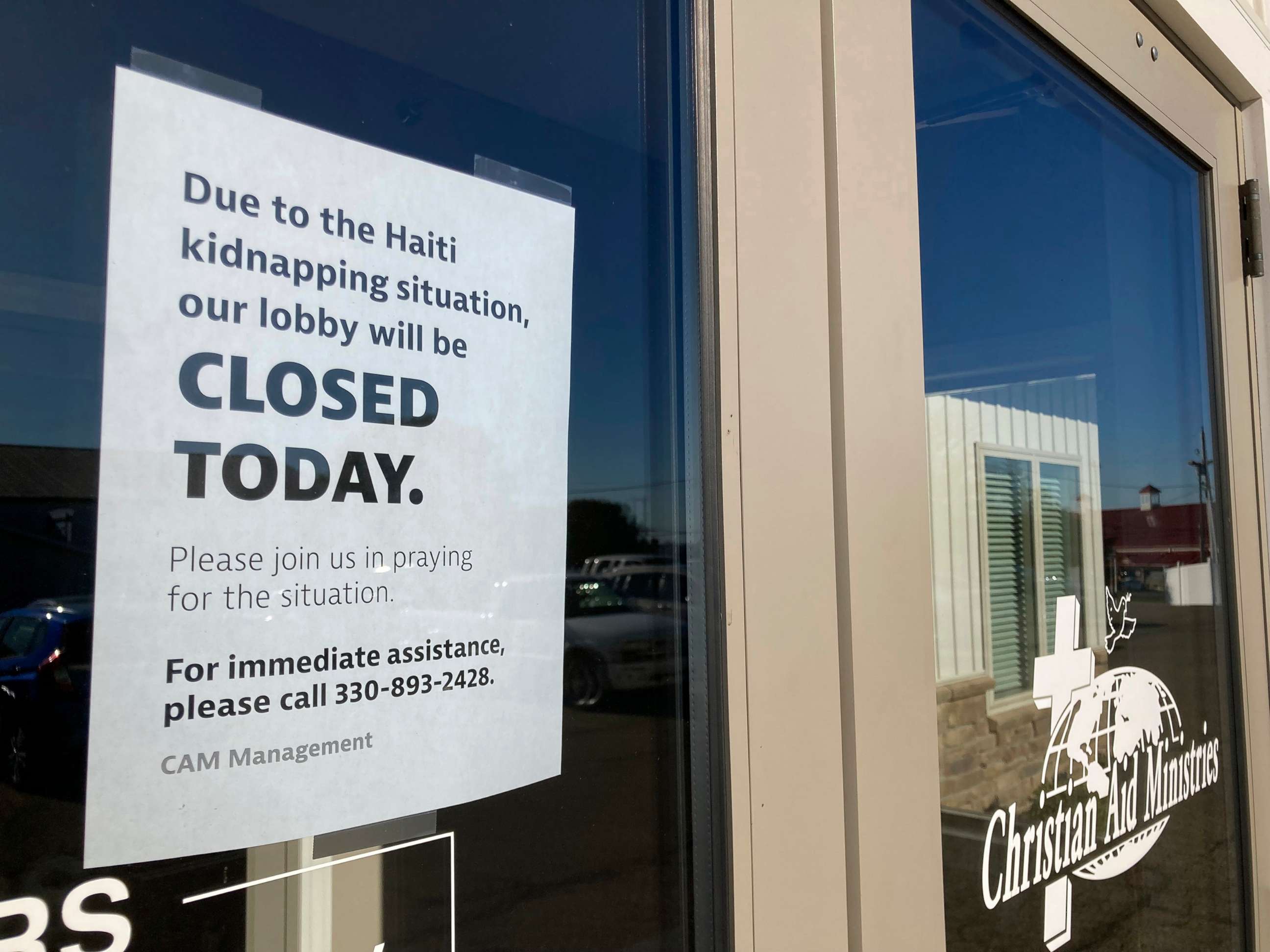 PHOTO: A closed sign is posted at The Christian Aid Ministries headquarters in Berlin, Ohio on Oct. 18, 2021, following the kidnapping of their staff in Haiti.