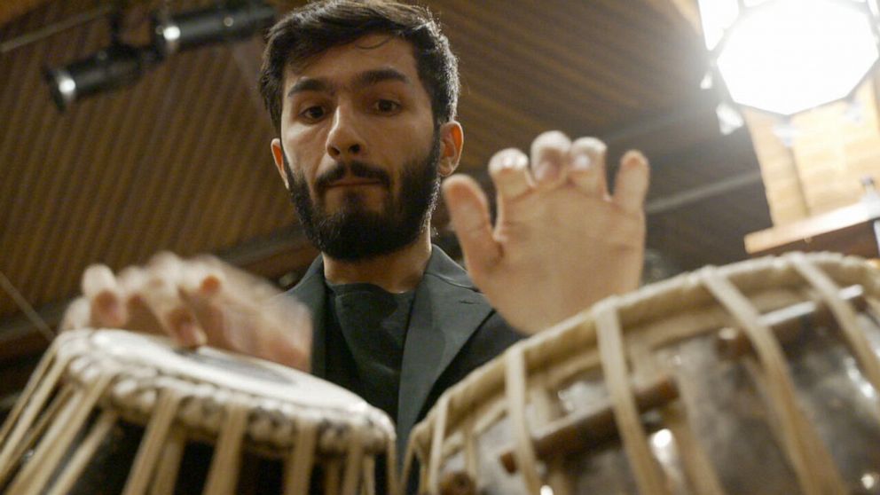 PHOTO: Hamid Khpolwak is playing the tabla, a traditional Afghan instrument, during a charity concert on Capitol Hill in Washington, D.C., to benefit Afghan refugees in America.