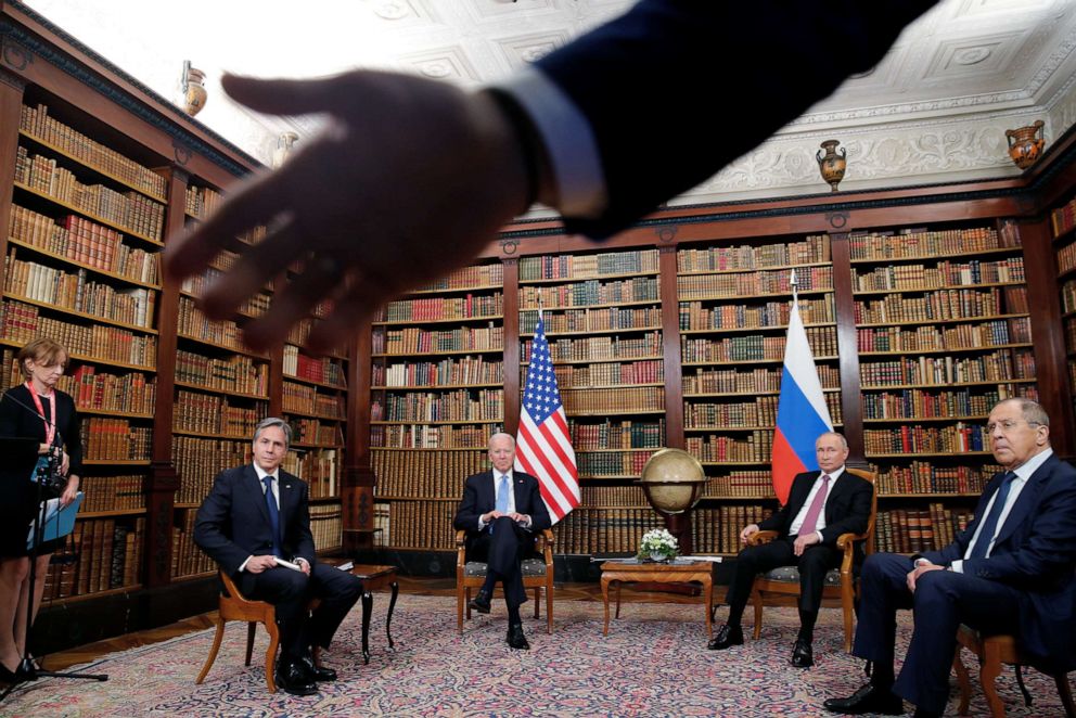 PHOTO: A security officer indicates to the media to step back as U.S. President Joe Biden and Russia's President Vladimir Putin prepare to meet for the U.S.-Russia summit at Villa La Grange in Geneva, Switzerland, June 16, 2021.