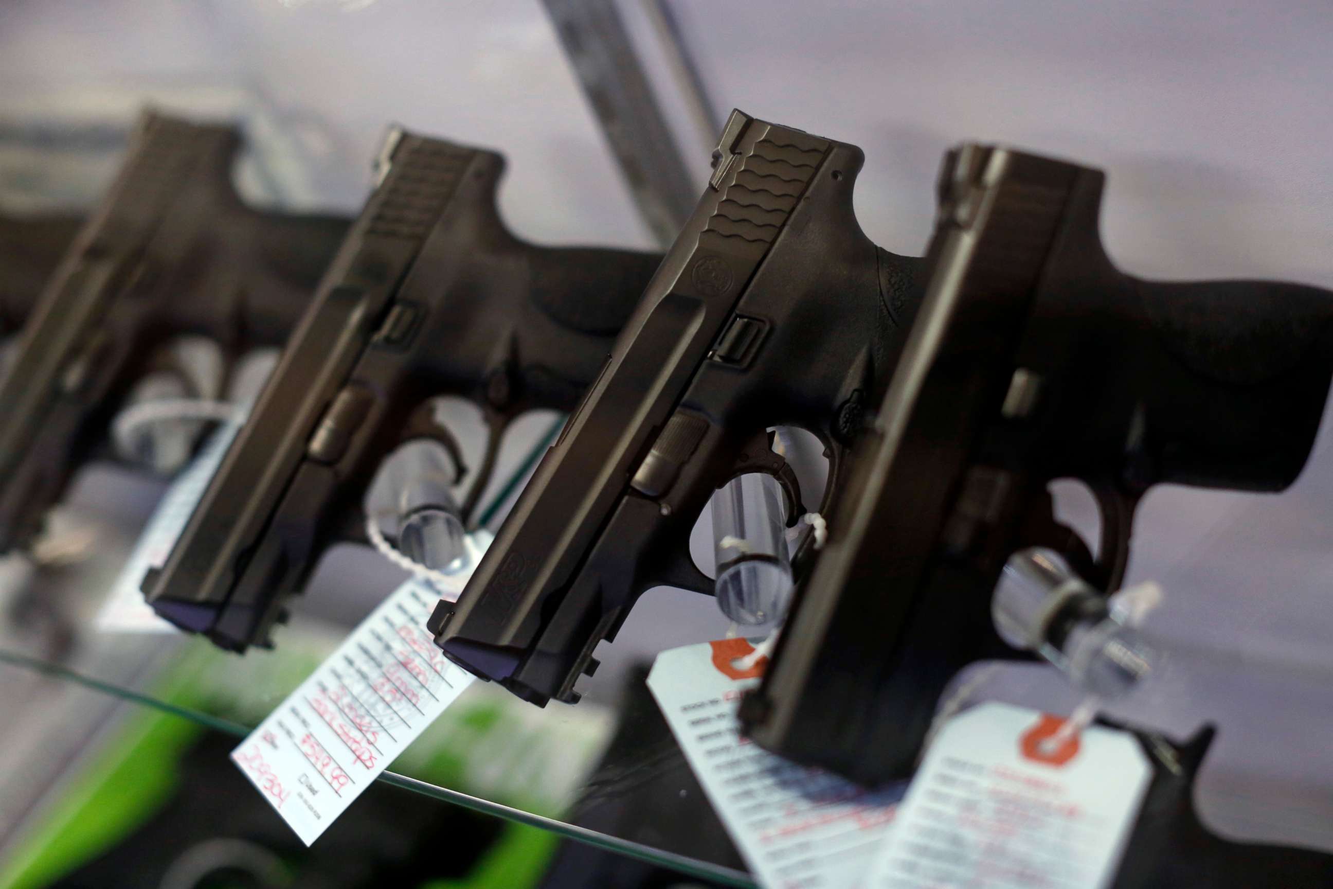 PHOTO: Handguns are seen for sale in a display case at Metro Shooting Supplies in Bridgeton, Mo., Nov. 13, 2014.