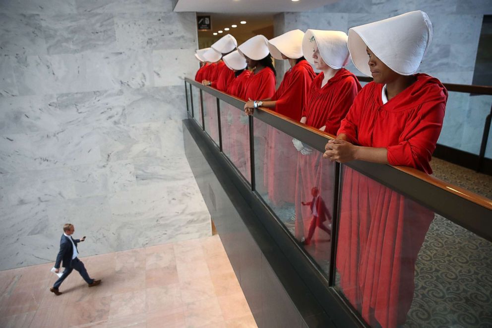 PHOTO: Protesters dressed in The Handmaid's Tale costume, protest outside the hearing room where Supreme Court nominee Judge Brett Kavanaugh will testify before the Senate Judiciary Committee on Capitol Hill, Sept. 4, 2018 in Washington, D.C.