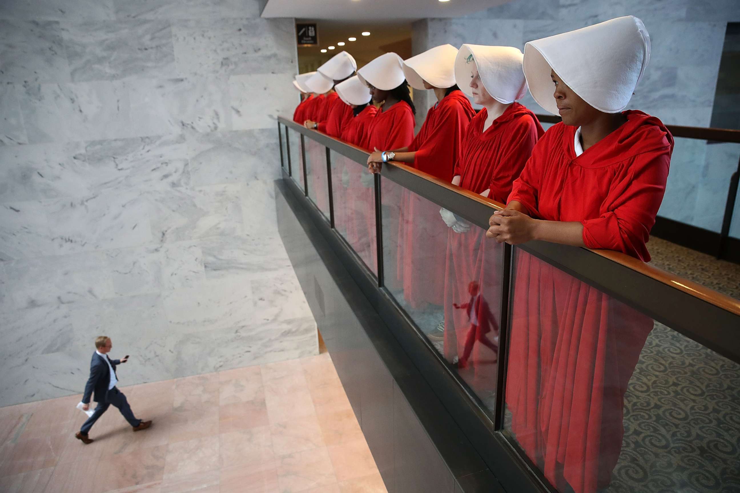 PHOTO: Protesters dressed in The Handmaid's Tale costume, protest outside the hearing room where Supreme Court nominee Judge Brett Kavanaugh will testify before the Senate Judiciary Committee on Capitol Hill, Sept. 4, 2018, in Washington, D.C.