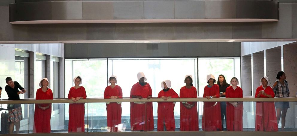 PHOTO: Protesters dressed in The Handmaid's Tale costume, protest outside the hearing room where Supreme Court nominee Judge Brett Kavanaugh will testify before the Senate Judiciary Committee on Capitol Hill, in Washington, Sept. 4, 2018.