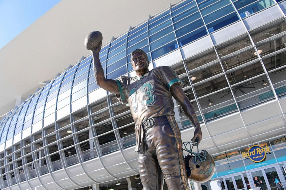 PHOTO: The statue of Miami Dolphins quarterback Dan Marino outside the stadium before Hard Rock Stadium, July 26, 2017, in Miami.