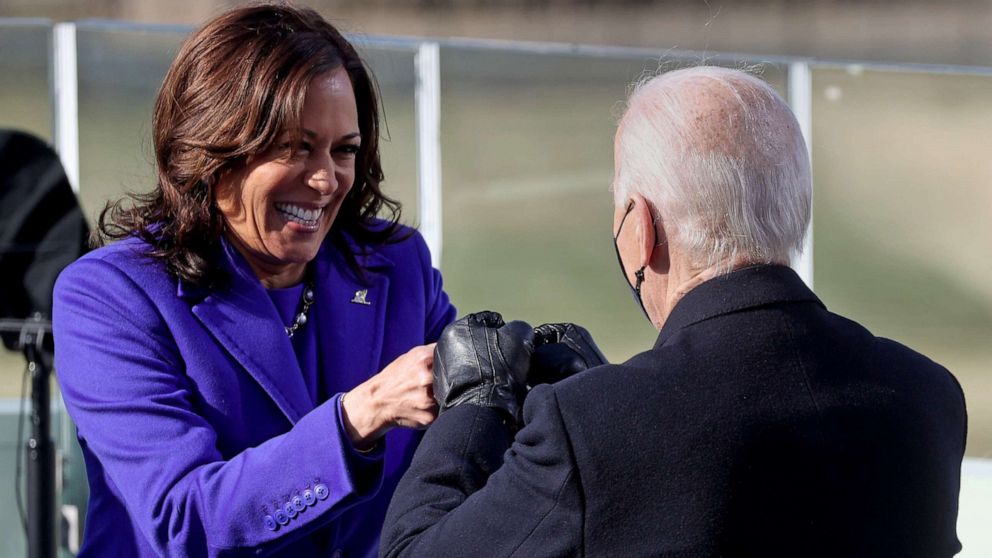 PHOTO: Kamala Harris bumps fists with Joe Biden after being sworn in as Vice President of the United States during the inauguration on the West Front of the U.S. Capitol in Washington, D.C., Jan. 20, 2021.