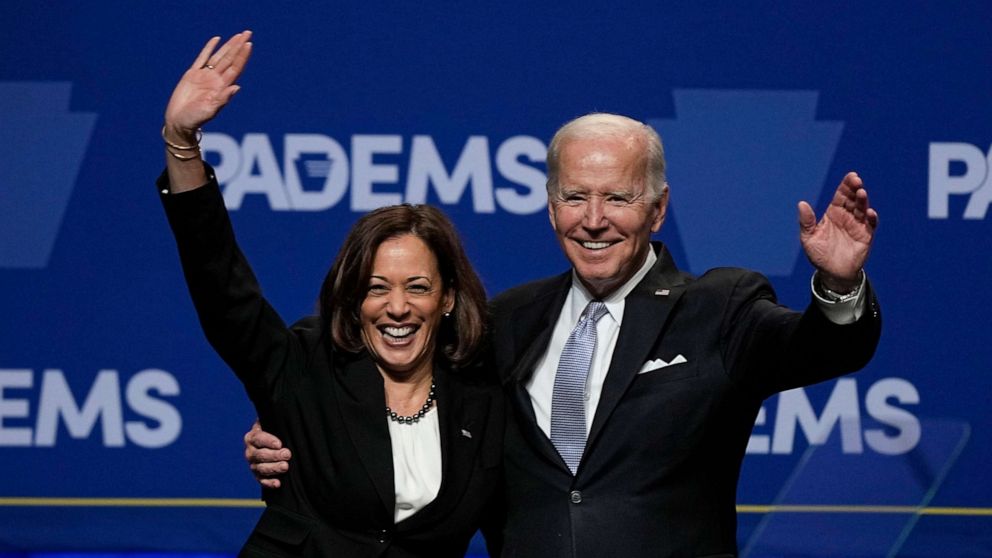 PHOTO: President Joe Biden waves with Vice President Kamala Harris at the Pennsylvania Democratic Party's 3rd Annual Independence Dinner in Philadelphia, Oct. 28, 2022.