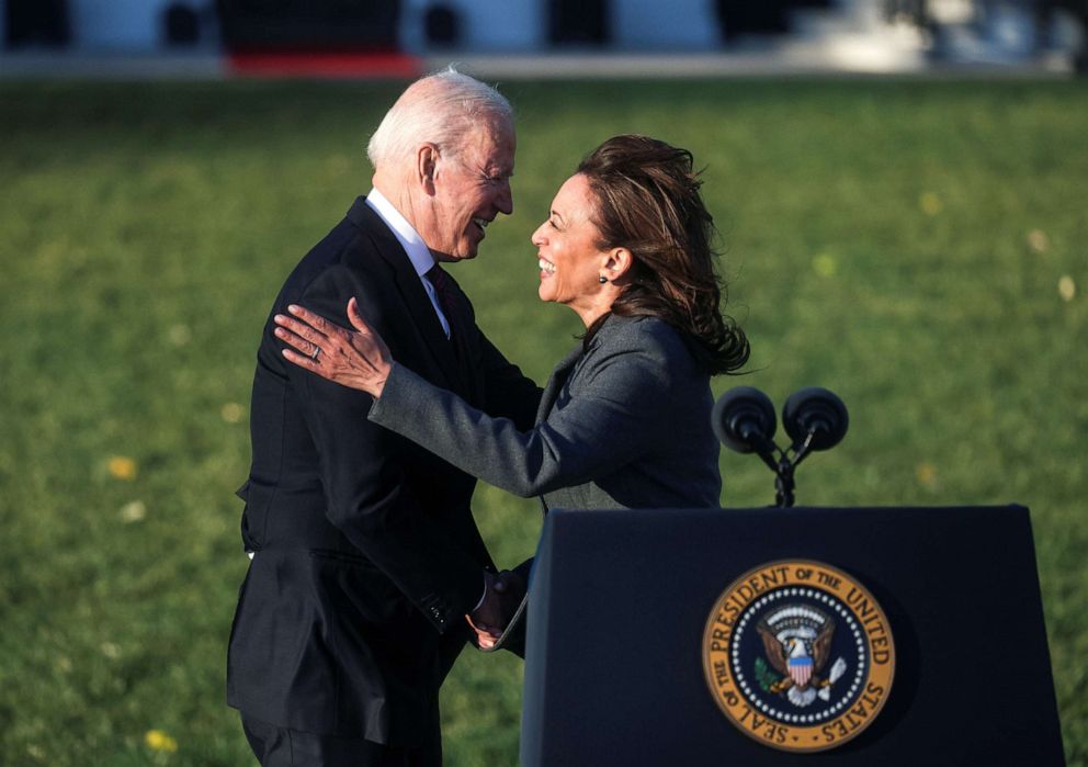 PHOTO: President Joe Biden shakes hands with  Vice President Kamala Harris at the ceremonial signing of the "Infrastructure Investment and Jobs Act", on the South Lawn at the White House, Nov. 15, 2021.