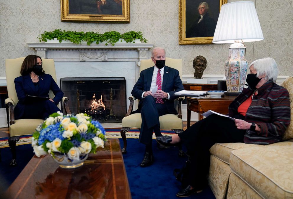 PHOTO: Vice President Kamala Harris, left, and President Joe Biden meet with Treasury Secretary Janet Yellen, right, in the Oval Office of the White House, Jan. 29, 2021, in Washington, D.C.  