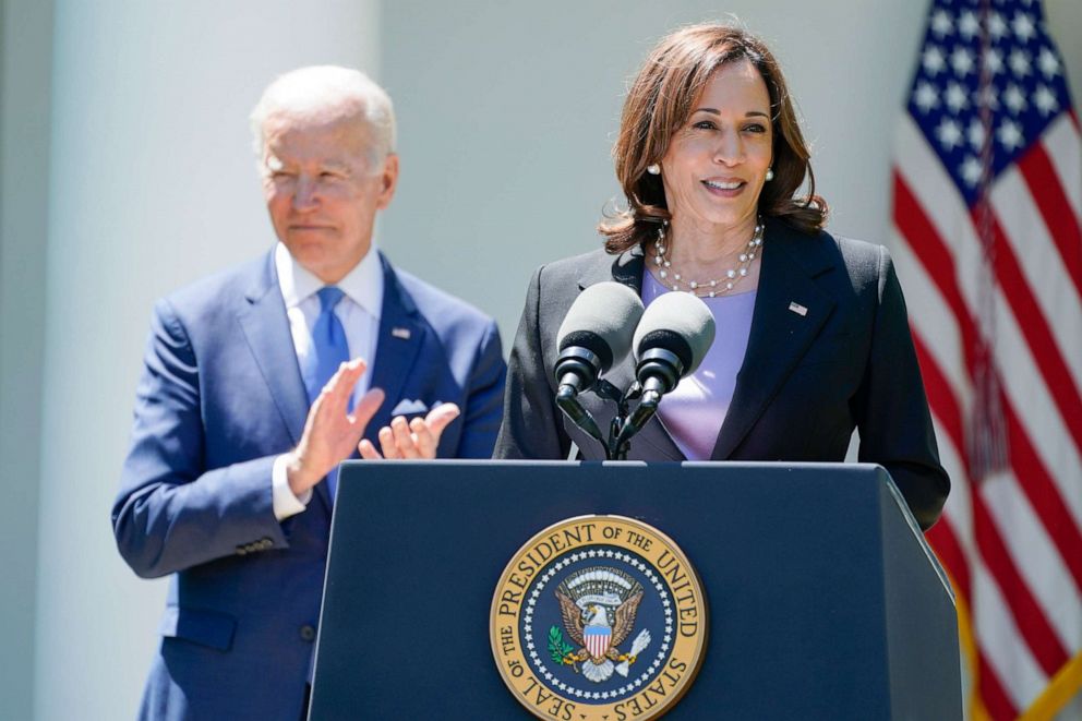 PHOTO: President Joe Biden cheers as Vice President Kamala Harris speaks at an event to lower the cost of high-speed internet at the Rose Garden of the White House, May 9, 2022, in Washington. 
