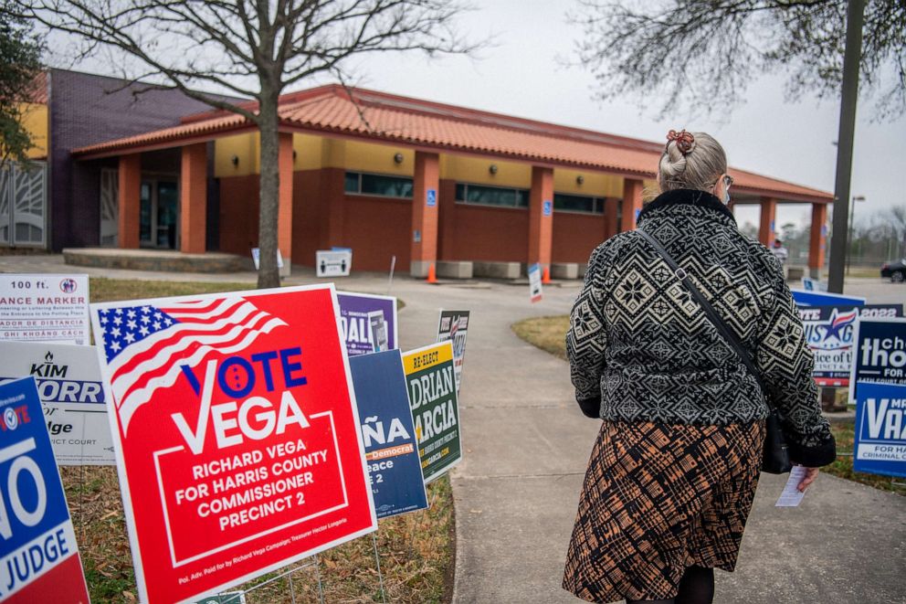 PHOTO: A person walks to cast their ballot at the Moody Community Center on Feb. 24, 2022, in Houston, Texas.