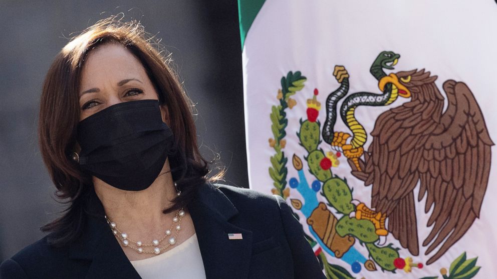 Vice President Kamala Harris looks on as she and Mexico's President Andres Manuel Lopez Obrador attend a signing ceremony establishing a strategic partnership to cooperate on development programs in the Northern Triangle in Mexico City, Mexico.