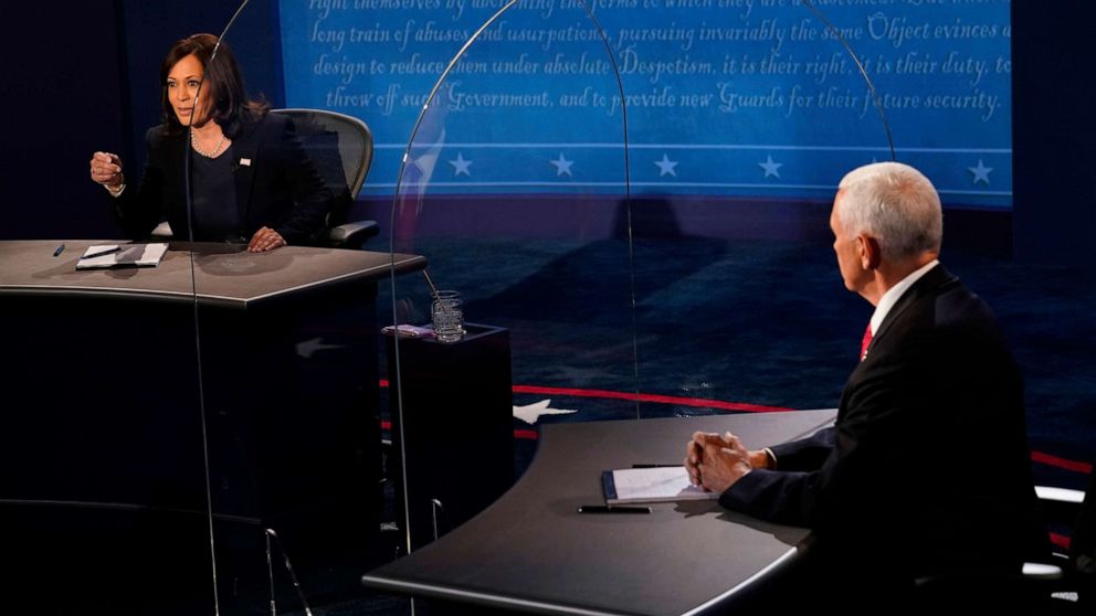 PHOTO: Democratic vice presidential candidate Sen. Kamala Harris answers a question as Vice President Mike Pence listens during the vice presidential debate, Oct. 7, 2020, at Kingsbury Hall on the campus of the University of Utah in Salt Lake City.