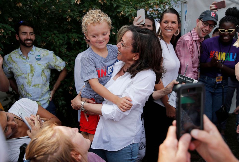 PHOTO: Democratic presidential candidate Sen. Kamala Harris holds Brady, the son of Democratic presidential candidate Rep. Tim Ryan, D-Ohio, at the Iowa State Fair, Saturday, Aug. 10, 2019, in Des Moines, Iowa.