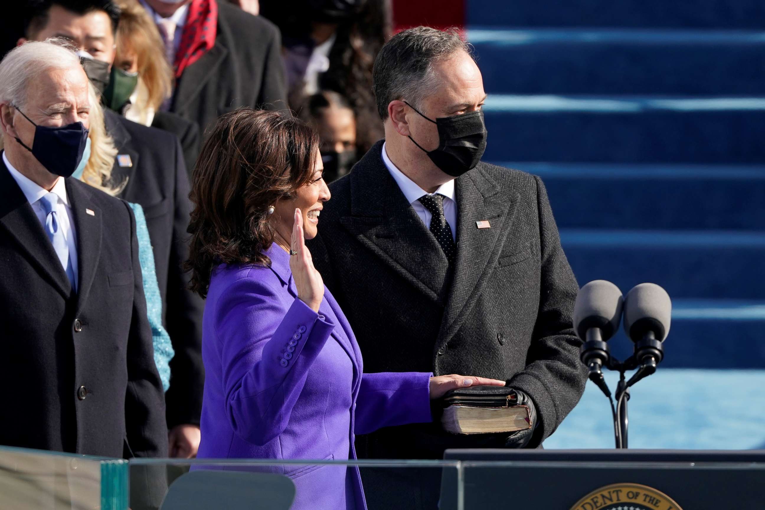 PHOTO: Kamala Harris is sworn in as Vice President as her spouse Doug Emhoff holds a bible during the inauguration of Joe Biden as the 46th President of the United States on the West Front of the U.S. Capitol in Washington, Jan. 20, 2021.